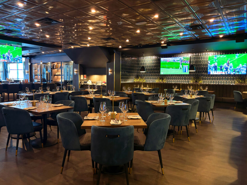 Exchange Restaurant and Bar inside ECAC - preparing tables for dinner service